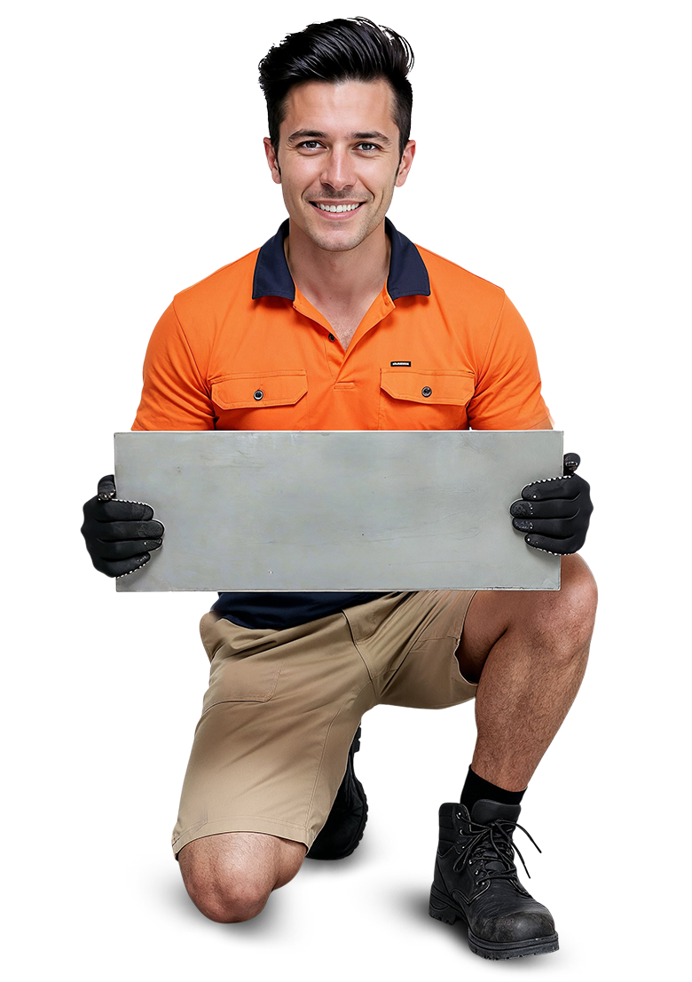 Worker installing large ceramic tile